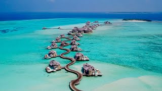 Maldives 4K  Beautiful relaxing music  surreal drone footage [upl. by Karina758]