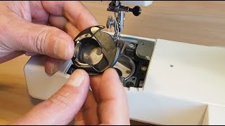 Drop in Bobbin Case Removal and Refitting [upl. by Aihtenyc]