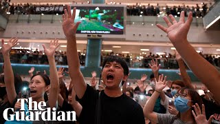 ‘Glory to Hong Kong’ Hundreds gather to sing protest ‘anthem’ [upl. by Ahsiekat]